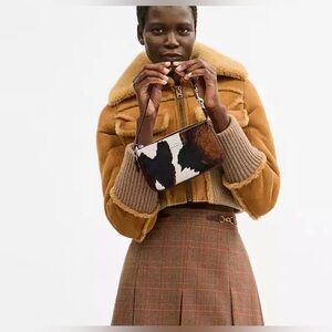 Coach Nolita 19 With Cow Print.   New no tag .